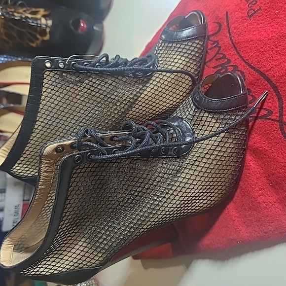 Christian Louboutin - Picture 1 of 8
